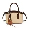 Bolsa de camurça retrô para mulheres, novo estilo 2026, adequada para o trabalho, pequena bolsa tote, bolsa tipo balde crossbody para o trajeto