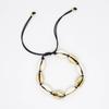 Pulseira boêmia transfronteiriça direta da fábrica de concha natural, pulseira versátil tecida à mão com banho de metal