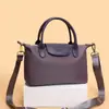 Bolsa tipo dumpling de color block de comercio exterior para mujer, nuevo modelo 2026, bolso de hombro casual versátil, bolso de mano texturizado para ir al trabajo y uso cruzado