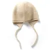 Cachemira Otoño/Invierno 2026 Nuevo para Mujer de Gama Alta Color Sólido Tejido Cálido Moda Peso Pesado Rayas Protección para Orejas Sombrero Casual