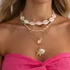 Collar multicapa de concha de playa con estrella de mar estilo europeo y americano para mujer, gargantilla de cadena para clavícula con cuentas de arroz estilo vacacional