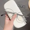 Nuevo marco de gafas metálico poligonal retro artístico pequeño, marco de gafas liso de moda Danyang al por mayor, se puede equiparar con lentes graduados