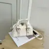 Elegante bolso de mano pequeño retro exquisito para mujer, nuevo modelo de verano 2026, adecuado para el trabajo y los desplazamientos, bolso de hombro y cruzado