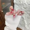 Falda de Encaje con Lunares Ojos de Gato Versátil Simple Lazo en Forma de Corazón Uñas Ojos de Gato Método de Dos Colores Negro y Rojo