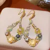 Pendientes Redondos Plegados con Borlas Tachonados de Pedrería Estilo Retro Europeo y Americano, de Moda y Versátiles, con un Toque de Lujo Ligero y de Alta Gama