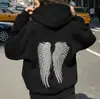 Conjunto de Moletom e Calça Casual Feminino Tendência Outono e Inverno Europeu e Americano com Asas de Lantejoula Moda Versátil Cor Sólida Conjunto de Duas Peças Venda por Atacado