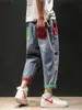 Jeans rasgados de moda para hombre con cintura elástica y cordón, corte recto holgado, estilo callejero americano, bolsillos de color en bloque geniales