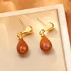 Pendientes Rojos de Gota de Agua de Año Nuevo, Populares en Xiaohongshu, Pendientes de Gota de Esmalte con un Toque de Lujo, Modernos, Elegantes, Versátiles y con Estilo, Tachuelas