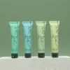 Envase de Tubo Suave Transparente Verde con Tapa Flip-Top Delgado para Cosméticos y Cuidado Personal de Uso Diario, Diseño Personalizable