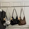 Bolsa Tote Retrô de Comércio Exterior Feminina Sensação de Alto Padrão Grande Capacidade Versátil Bolsa de Ombro Único Bolsa de Mão para o Dia a Dia Envio Direto da Fábrica de Origem