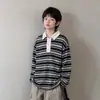 Polo de otoño para niño 2026 nuevo estilo coreano de manga larga a rayas para niños mayores, camiseta básica de otoño para niños