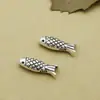 Accesorios de plata de ley S925 al por mayor Plata tailandesa pez mini de doble cara cuentas con agujero mediano material para abalorios DIY hecho a mano