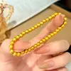 Pulsera de cuentas chapada en oro vietnamita, lujo ligero con un toque de alta gama, exquisita pulsera elástica de cuentas que no se decolora durante mucho tiempo, versátil y de nicho