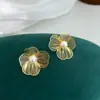 Pendientes Metálicos Huecos de Flor de Lujo de Gama Alta, Nuevos Pendientes Populares de Diseño de Nicho para Mujer, Elegantes y con Estilo Accesorios para Orejas