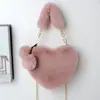 Bolso de mano transfronterizo con forma de corazón de felpa, bolso de hombro y bandolera para mujer, bolso de cadena de piel sintética de conejo, bolso lindo con forma de corazón, modelo nuevo