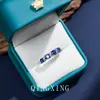 Anillo de Lujo Accesible Estilo Europeo y Americano Corindón Rojo Zafiro Anillo Vivo Diseño Geométrico de Diamante Personalizado Anillo Completo de Zirconia para Mujer