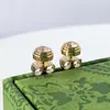 Pendientes de Joker de personalidad simple japonesa y coreana, pendientes de un solo diamante, chapados en oro de 18 quilates, pendientes de alta versión CNC seiko, venta al por mayor
