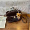 Moda de nicho transfronteiriça bolsa pequena quadrada de pelúcia feminina 2026 nova bolsa de pelo versátil bolsa tiracolo de grande capacidade fofa