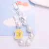 Llavero Colgante de Oso de Dibujos Animados Lindo para Hacer Tú Mismo Accesorios de Cuentas Redondas de Agujero Recto de Color Caramelo Decoración para Funda de Auriculares
