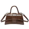 Bolsa quadrada pequena versátil para mulheres, nova bolsa de mão mini simples da moda 2026, bolsa de ombro crossbody de luxo leve na moda