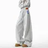 Calça de Moletom Xadrez Color Block Retrô Americana Outono Inverno Unissex Perna Larga Solta Versátil Tendência 2025 Nova Calça Esportiva