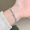 Pulsera de flor de glicina de nuevo estilo, exquisito diseño de sonrisa, repleta de diamantes, versátil, de alta gama, pulsera de lujo ligero, regalo para la mejor amiga o novia.