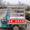 Carrito de tres ruedas puesto de exhibición estante a prueba de viento y polvo tanghulu liangpi platillos estofados completamente cerrado estante de exhibición plegable de tres niveles