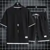 Camiseta de Manga Corta tipo Waffle para Hombre Traje Deportivo Casual Venta al por Mayor Verano Holgado Falso Conjunto de Dos Piezas Camiseta de Media Manga Conjunto de Dos Piezas