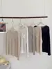 Camiseta básica de lino Tencel para mujer con bolsillos, top de cuello redondo, nueva blusa Lyocell amigable con la piel para primavera/verano, camiseta básica de manga larga