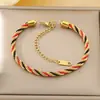 Pulseira Torcida Colorida de Aço Inoxidável Fashion e Personalizada Estilo Ins Artesanal Banhada a Ouro 18K Joia de Mão Atacado