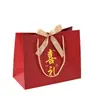 Bolsas de mano con relieve dorado para regalos de boda, bolsas de regalo, bolsas de recuerdo, bolsas de embalaje para regalos de boda al por mayor