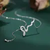 Collar de serpiente pequeña con borla brillante s925 plata de ley 2025 nuevo serpiente pequeña de luz lujo todo partido cadena para clavícula para mujeres