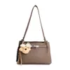 2026 Otoño Simple Nuevo de Alto Valor Moderno Bolso de Mano con Correa al Hombro para Mujer de Nicho Elegante Individual Bolso Cruzado para Mujer