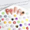 Popular joyería de uñas de dibujos animados transfronteriza que cambia de color luminosa de color sólido garra de gato joyería de uñas al por mayor accesorios de uñas lindos