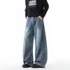 Calça jeans masculina estilo workwear americano, com retalhos e barra curva, marca trendy cleanfit, calça longa com caimento casual solto e perna larga
