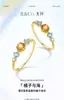 "Naranja y Mar" Chapado en Oro de 18 Quilates Piedra de Alta Imitación Anillo Natural Color Topacio Azul Lujo Ligero Todo Fósforo Anillo para Mujer
