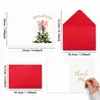 Novo design transfronteiriço: um cartão de Natal com um único laço rosa e envelope, perfeito para votos e mensagens de fim de ano