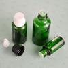 Directo de Fábrica 5ml10ml15ml20ml30ml50ml100ml botella de vidrio para aceites esenciales botella de vidrio verde para aceites esenciales