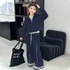 Conjunto Esportivo Casual Moda Coreana para Meninas Primavera e Outono Solto Conjunto de Três Peças com Moletom Meio Zíper Elegante Novo 2026