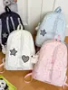 Mochila de orejas caídas de lunares transfronteriza para estudiantes mujeres, nuevo modelo 2026, mochila de nicho de alta apariencia y gran capacidad