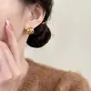 Pendientes Retro de Nicho Dorados de Doble Círculo a Cuadros para Mujer, Pendientes de Lujo Ligero de Gama Alta, Nuevo Estilo Caliente 2026