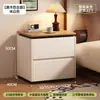 Mesita de noche de madera maciza para dormitorio del hogar 2026, lujo ligero con sensación de alta gama, pequeño mueble de almacenamiento negro estilo vintage para sala de estar