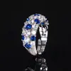 Huabi Joyería Fondo de Cobre Chapado en Oro Cristal Azul Puntiagudo Simulado Corindón Rojo Anillo Estilo Retro Fila de Diamantes Anillo Venta al por Mayor