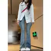 Jeans negros de microcampana talla grande para mujer 2024 nuevo otoño e invierno elásticos de cintura alta sueltos ajustados pantalones de herradura