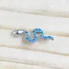 Pendiente de aleación de titanio F136 con forma de serpiente y circón G23 titanio rosca interna circón labio clavo lengua clavo cabeza de joyería perforada