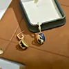 Nuevos Pendientes Retro Estilo Chino de Lapislázuli para Mujer, Joyería Vintage con un Toque de Lujo Ligero y Gama Alta, Pendientes Ovalados, Colgantes de Oreja de Nicho al por Mayor