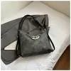 Bolso tote de gran capacidad para mujer, nuevo bolso de hombro de moda de verano 2026, mochila casual para estudiantes universitarios