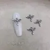 Accesorios para arte de uñas de aleación con forma de cruz gótica oscura transfronterizos, pendientes vintage europeos y americanos, accesorios de pedrería para uñas estilo punk gótico