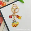 Llavero Colgante Año Nuevo 2026 Metal Zodiaco León Dorado Petardo Despertar Bolsa de la Fortuna Colgante Evento Pequeño Regalo
