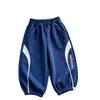 Pantalones largos para niños 2026 primavera y otoño nuevo estilo niños estampado de dibujos animados coreanos pantalones casuales pantalones jogger para bebé marca de moda para niñas